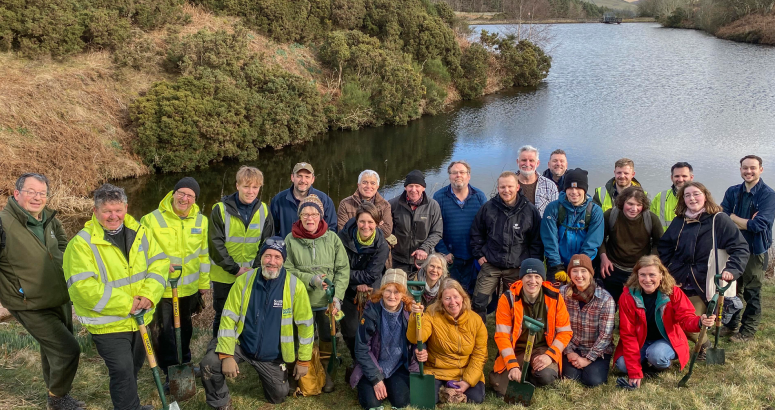 The team of volunteers who helped plant native trees at Knowes Dean Reservoir