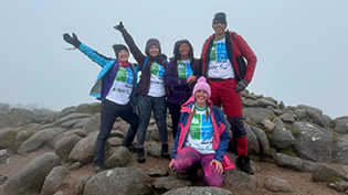Andrew Steel and his team on the summit of Derry Cairngorm