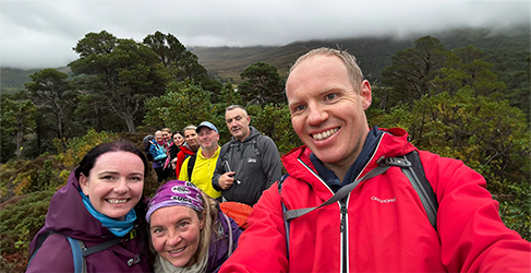 Chris Steele with his team on Derry Cairngorm raising money for WaterAid on the Munro Challenge 2024