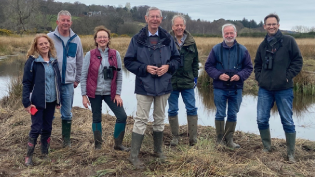 Inchgarth Biodiversity Initiative members at the edge of one of the new wader scrapes