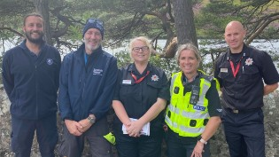 Colleagues shown at a Water Safety pop-up event